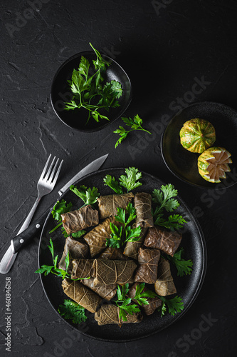 Plate with delicious sarma dish with parsley and lemon photo