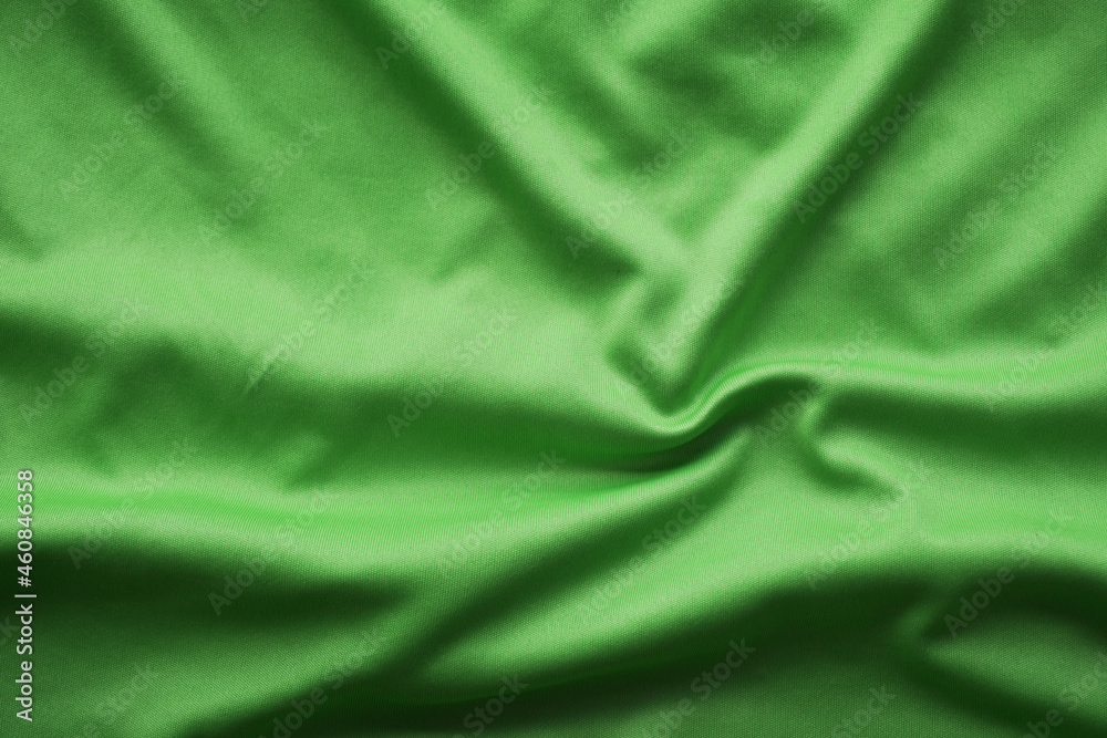 green silk fabric background, green sportwear cloth texture