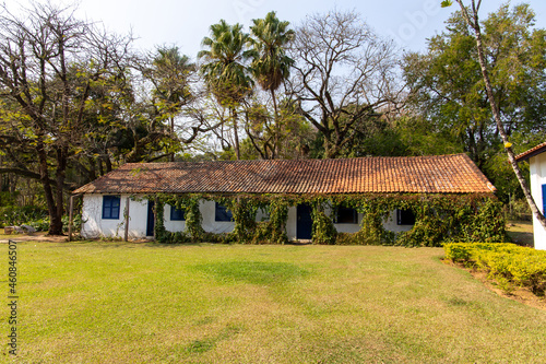 old colonial house on a historic farm in S  o Paulo  Brazil. Blue wooden windows.