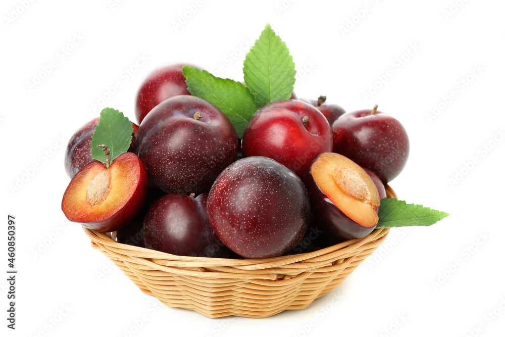 Plums in bowl isolated on white background, close up Plums in bowl isolated on white background, close up
