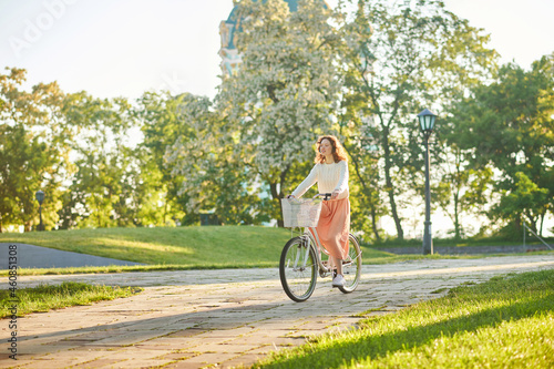 A young girl with a bike enjoying a morning