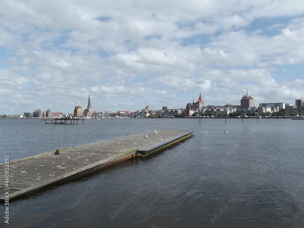 View from Gehlsdorfer Ufer over the Warnow to the skyline of Rostock, Mecklenburg-Western Pomerania, Germany, on the left the Petrikirche, middle right the Marian Cathedral