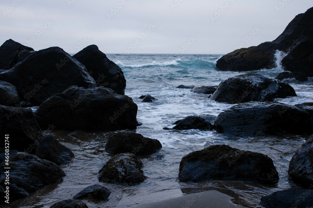 waves on the beach rocks in the sea blue ocean oregon west coast summer