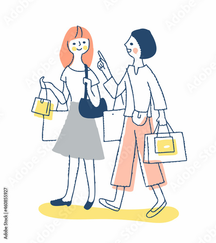 ショッピングを楽しんでいる笑顔の若い女性2人 © hisa-nishiya