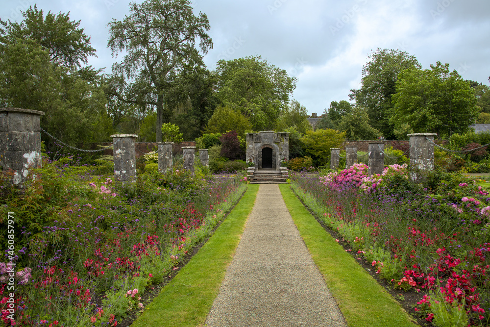 english country garden with archway