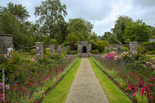 english country garden with archway