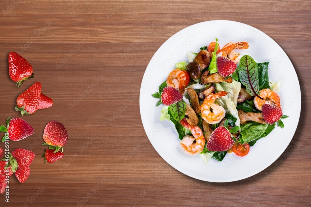 Fresh summer salad with strawberry. Summer salad, healthy eating