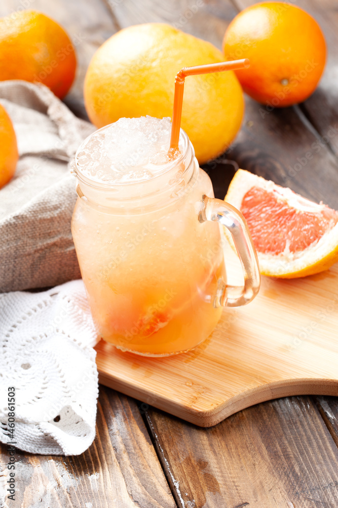 Citrus lemonade. On a wooden table. Citrus lemonade. On a wooden table.