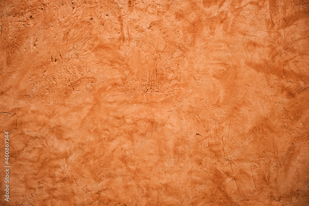 Terracotta colored plaster wall