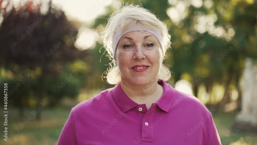 Fat woman in sportswear at the park Fat woman in sportswear at the park