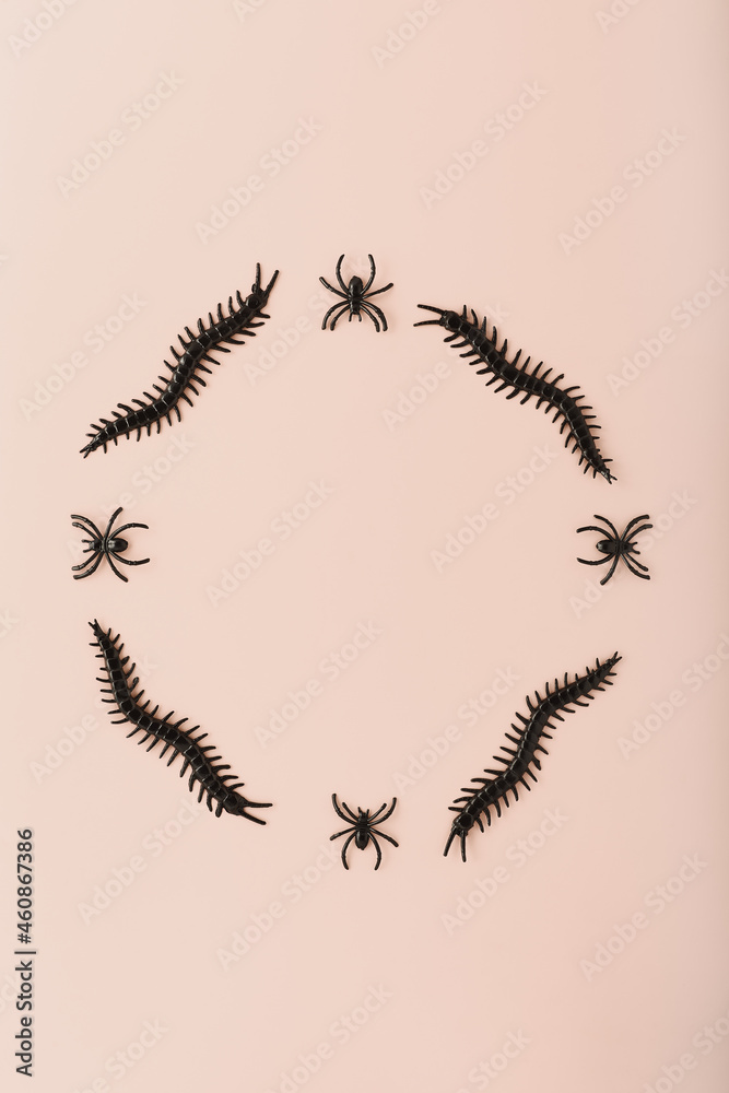 banner for halloween with place for text. scary decor for Halloween in black on a light pink background. minimalistic flat lay composition banner for halloween with place for text. scary decor for Halloween in black on a light pink background. minimalistic flat lay composition