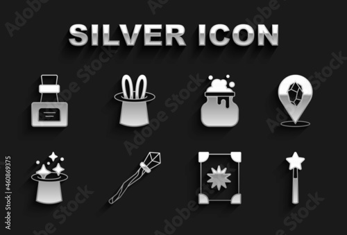Set Magic staff, stone, wand, Ancient magic book, hat, Witch cauldron, Bottle with potion and Magician rabbit ears icon. Vector