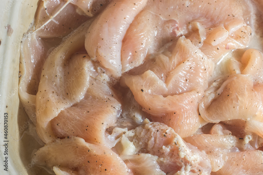 chicken fillet, texture with raw and seasoned chicken fillet chicken fillet, texture with raw and seasoned chicken fillet