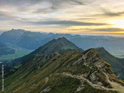 Beautiful sunset on the mountain. Peak Speer with a fantastic view of the swiss alps. Beautiful evening mood in autumn photo