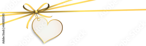 gold ribbon bow with heart hang tag