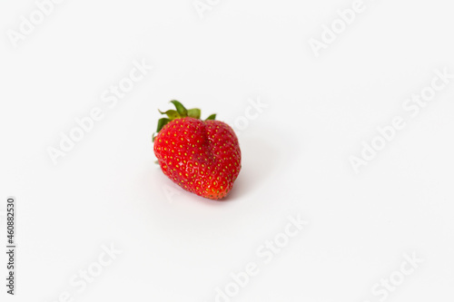 Red strawberry, arranged on a white background.