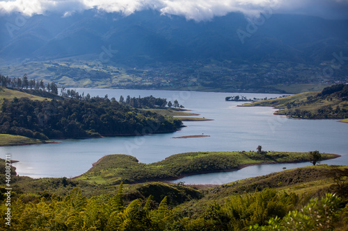Fototapeta Naklejka Na Ścianę i Meble -  View of the biggest artificial lake in Colombia called Calima Lake located on the mountains of Darien at the region of Valle del Cauca