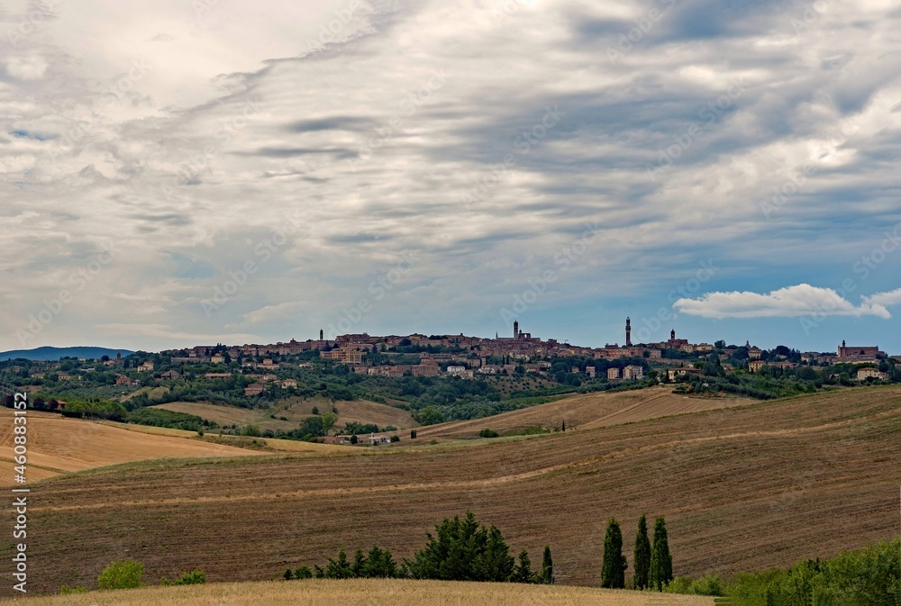 Landscape of the Tuscany Region in Italy and view over the town of Siena
