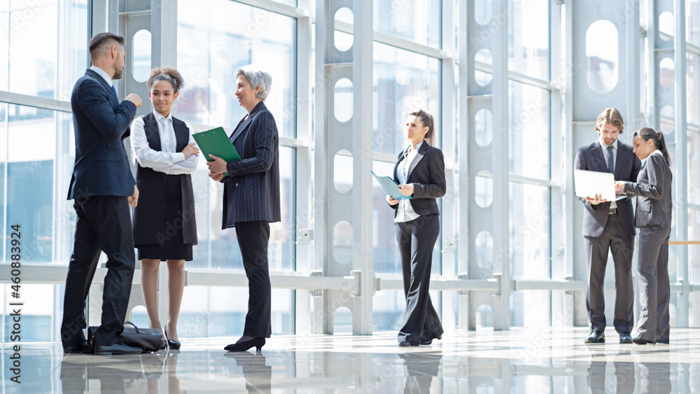 Business peopl talking about documents Business peopl talking about documents