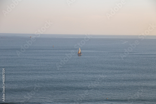 Santos beach panoramic view from above. With a view of Ponta da Praia and a large ship entering the Port of Santos