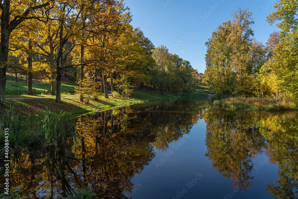 Latvia, Smiltene, Old park surrounded by autumn colors Latvia, Smiltene, Old park surrounded by autumn colors