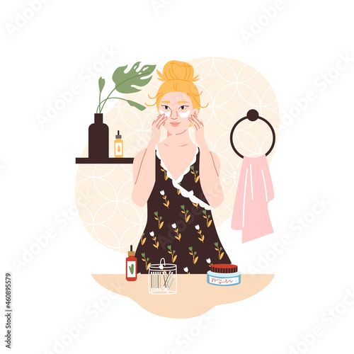 Woman with eye patches skin care mask at the bathroom