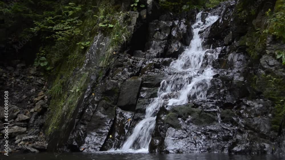 Beautiful waterfall in the mountains Beautiful waterfall in the mountains