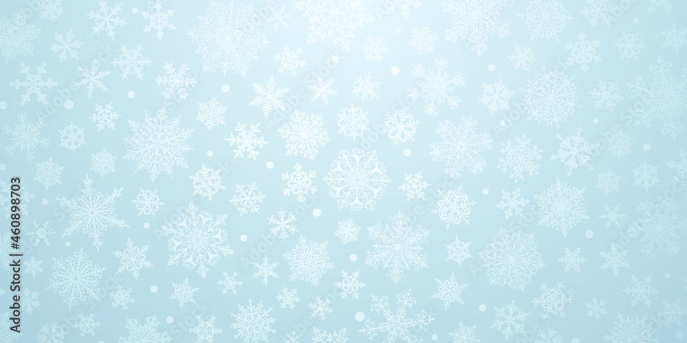 Christmas background of big and small complex snowflakes in light blue colors Christmas background of big and small complex snowflakes in light blue colors