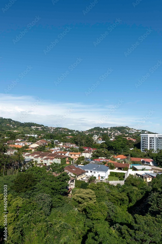 Panoramic city landscape with blue sky. Escazu, San Jose, Costa Rica. 
