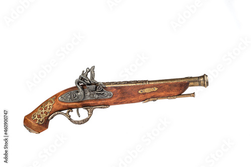 Side view of a mock-up of an antique pistol with bronze inlay.