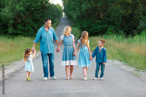happy family walking on the road concept joy relationship © Kostia