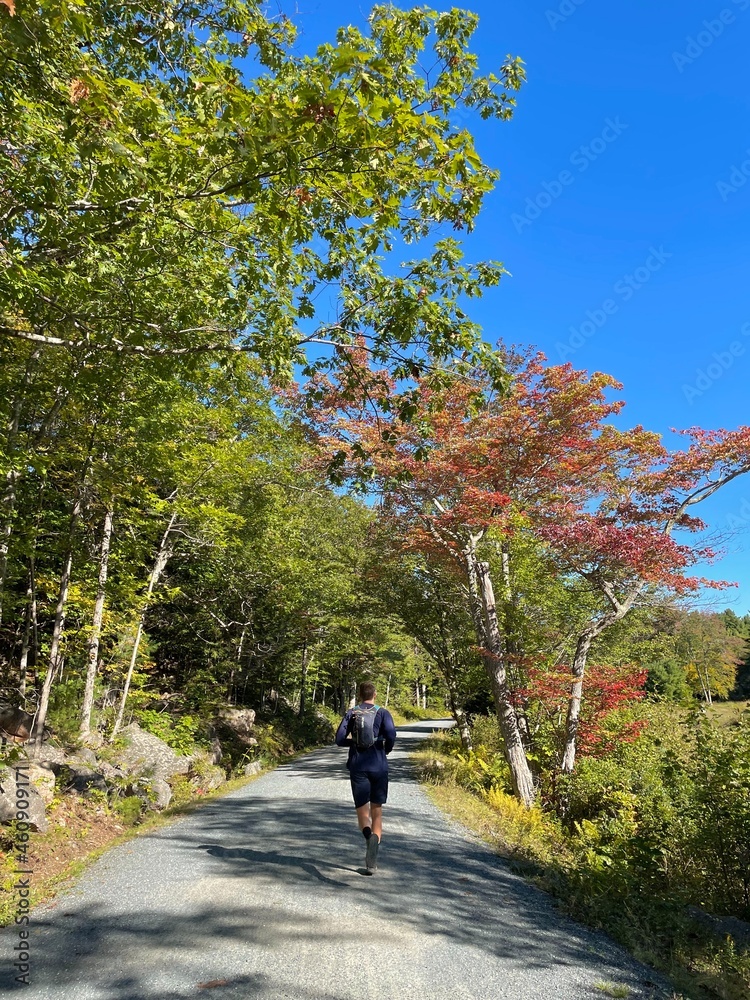 Running in Acadia National Park, Fall,  Maine, USA