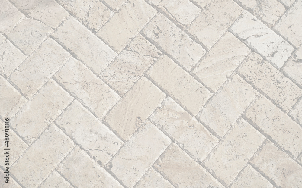 White brick pavers sidewalk background. Neutral texture of a flat brick wall close-up. White brick pavers sidewalk background. Neutral texture of a flat brick wall close-up.