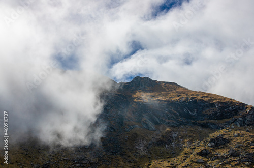 Landscape with clouds on mountain ridges © sebi_2569