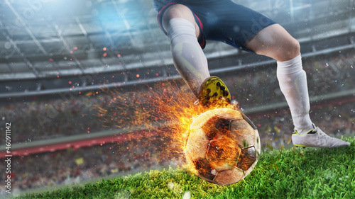 Powerful kick of a soccer player with fiery ball © alphaspirit