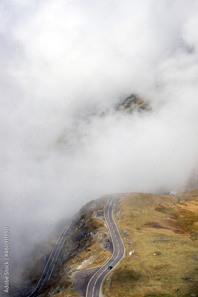 A mountain road through the fog