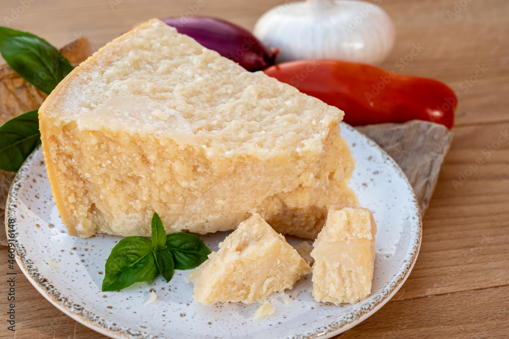Cheese collection, piece of matured cow cheese pasmesan parmigiano reggiano made from cow milk