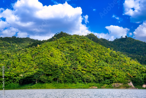 Tropical landscape with vibrant blue and green colors photo