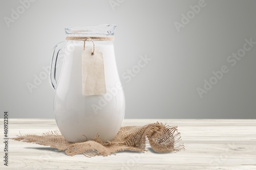 Pure milk drinks in clear jars and bottles, naturally healthy foods