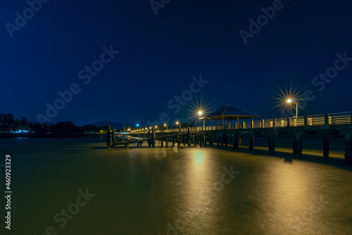 Long exposition night image of Rawai pier on phuket island in Thailand with silky looking water © Toyakisfoto.photos