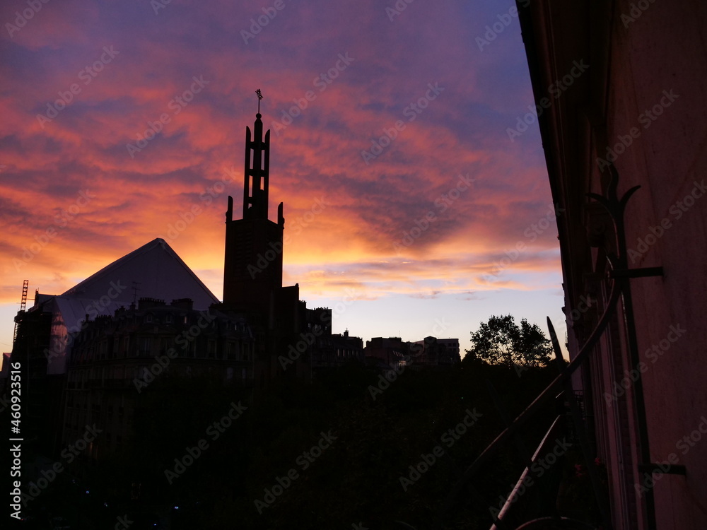 A sunset on a Parisian church.