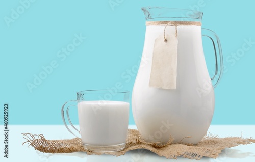 Pure milk drinks in clear jars and bottles, naturally healthy foods