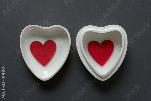 two hearts in heart shaped dishes