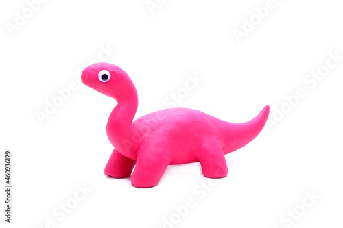 Pink Dinosaur isolated on white background. Handmade Pink Dino, play dough for kids DIY (Do it yourself) classroom photo