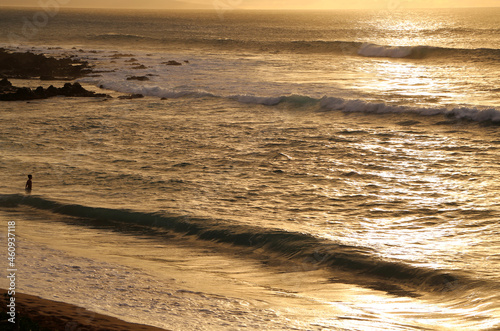 Fototapeta Naklejka Na Ścianę i Meble -  Golden Beach Waves at Sunset