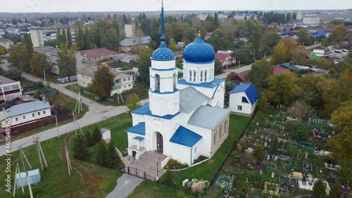 Chaplygin, Russia September 29, 2021 village of Yusovo, Lipetsk region. drone flight over the Christian temple of God church aerial photography before sunset from a bird's eye view photo