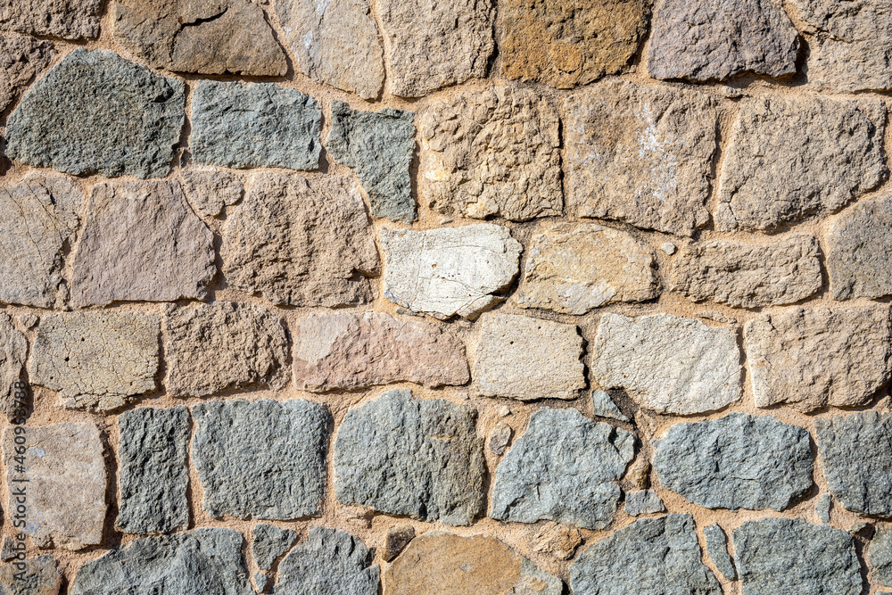 Fototapeta premium Background from a natural old stone wall