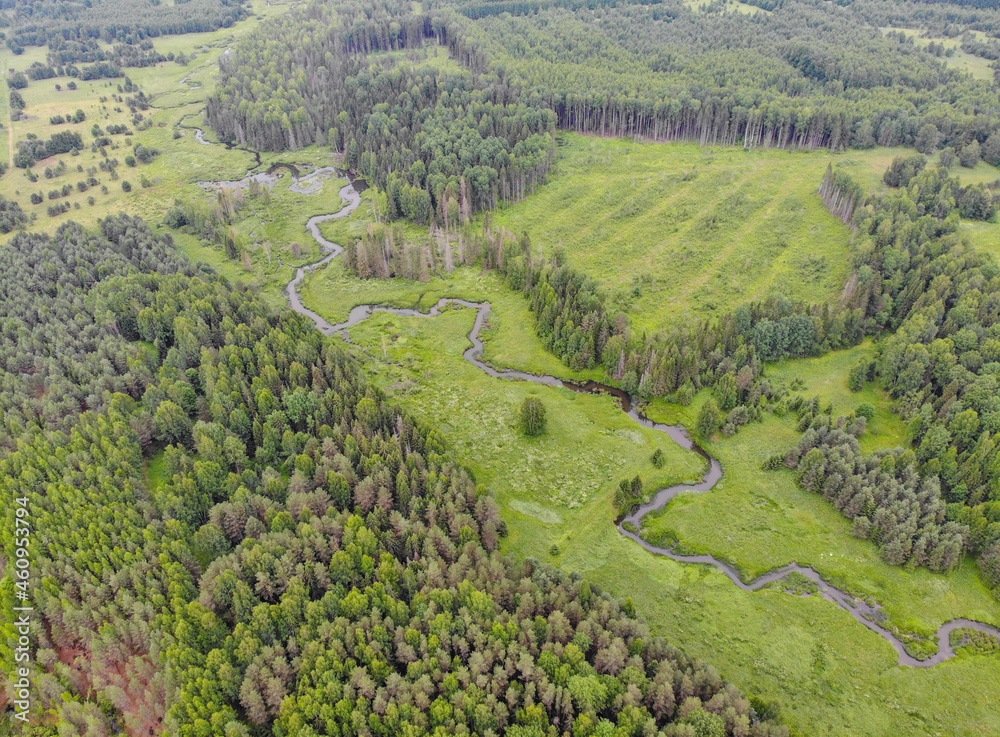 Aerial view of a small forest river (Kotelnich, Kirov region, Russia)