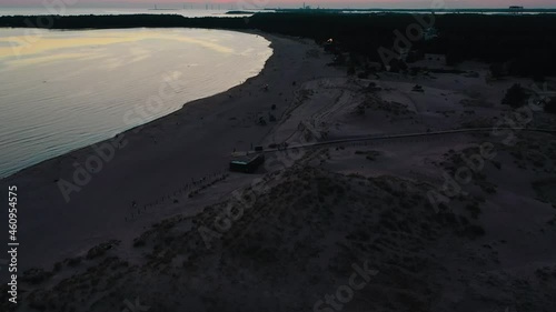 Aerial view overlooking the Yyteri beach, summer evening, Pori, Finland - tilt, drone shot photo