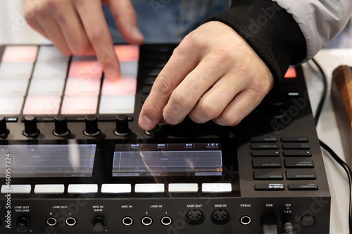 DJ mix and plays music using MIDI controller